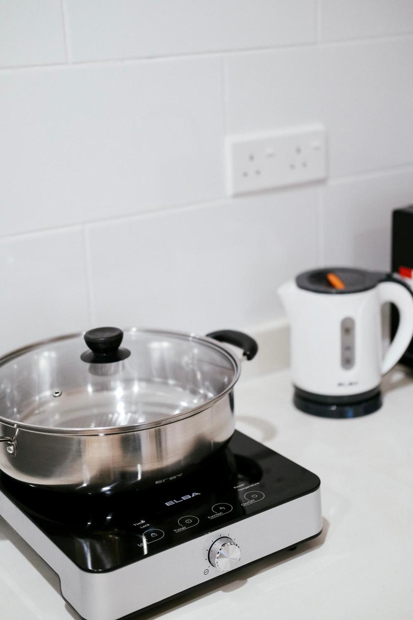 Arte Mont Kiara Aparthotel Kuala Lumpur Exterior photo A kettle and a pot on a stove