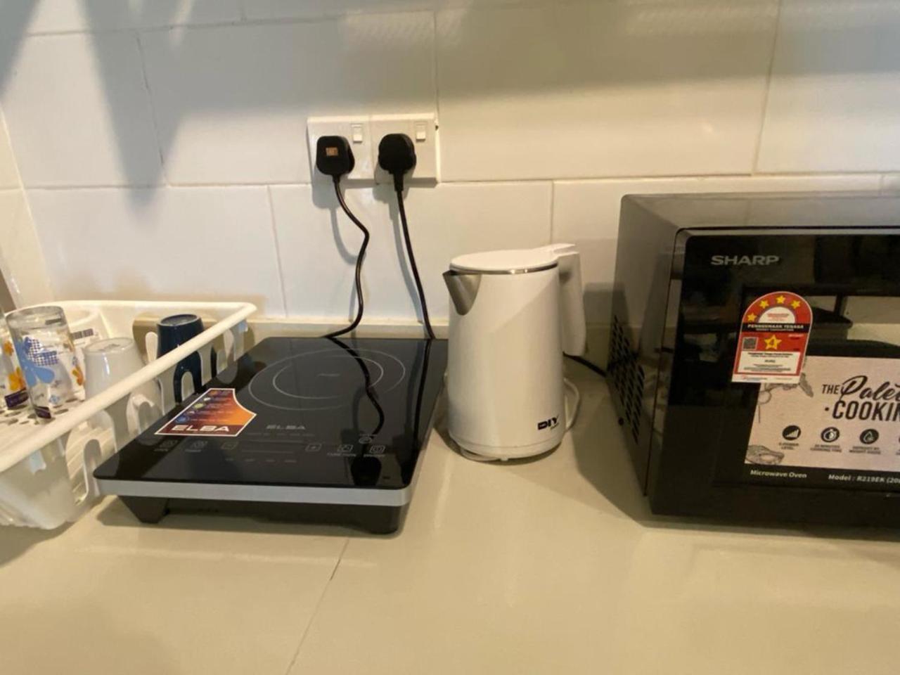 Arte Mont Kiara Aparthotel Kuala Lumpur Exterior photo A kettle and a microwave oven